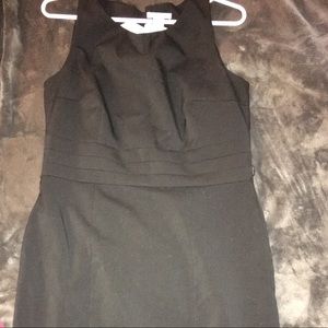 H&M black sleeveless knee length dress.